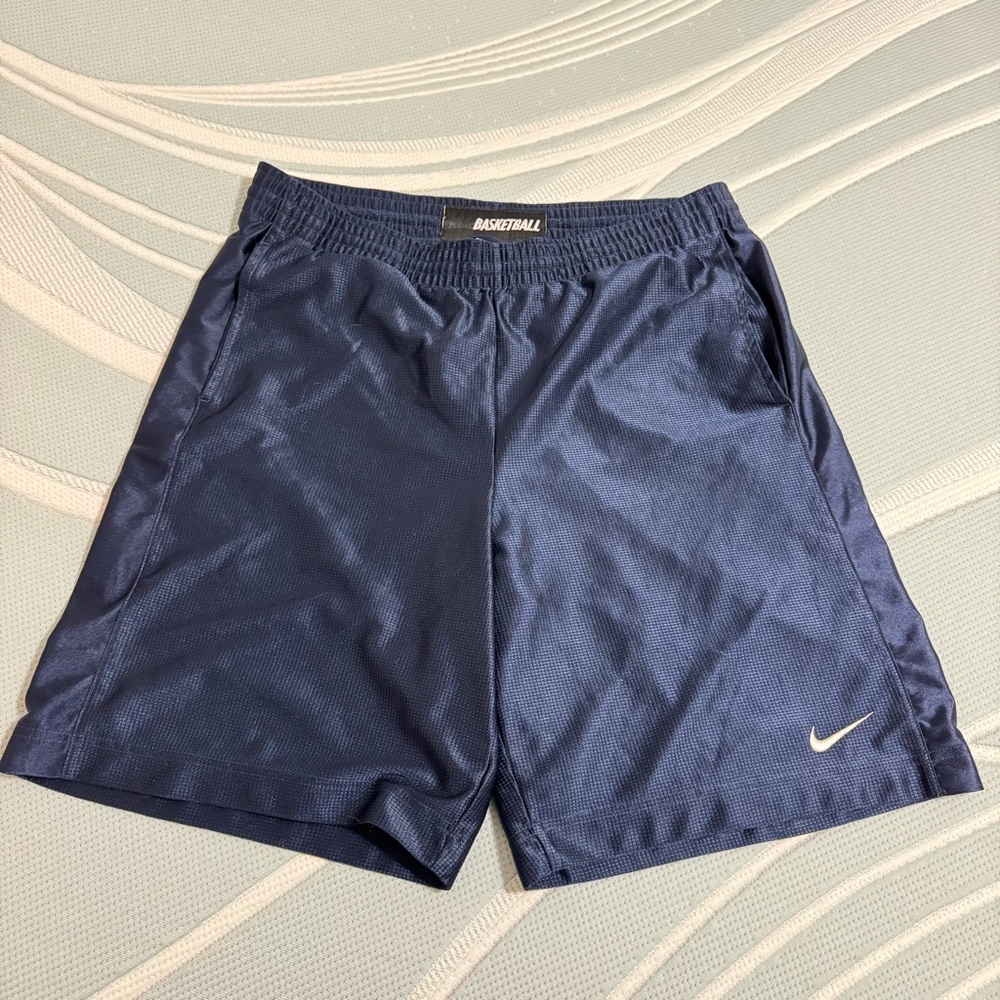 Nike men’s basketball shorts - size large